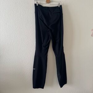 REI Co-op Cycles Cycling Pants Mens Black Nylon Waterproof Zip Ankle